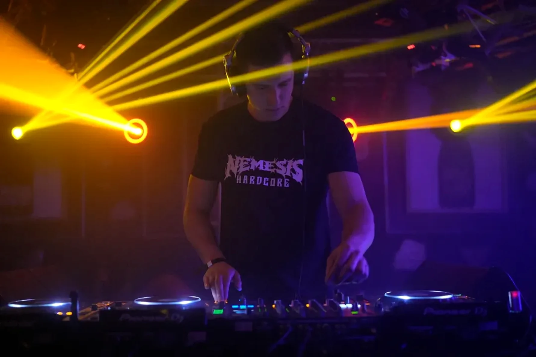 Nemesis Hardcore live set with yellow laser lights